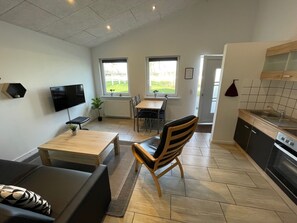 Appartement Confort, vue jardin | Intérieur