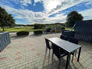 Appartement Confort, vue jardin | Restauration extérieure