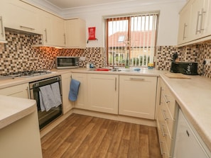 Dishwasher, high chair - Airy Hill Farm Cottage, Whitby (Whitby)