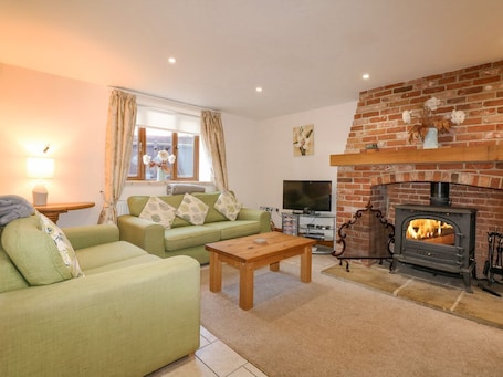 Fireplace. Hadleigh Farm Barn, King's Lynn