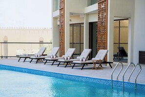 Outdoor pool, open 7:00 AM to 7:00 PM, sun loungers - Tulip Residences Muscat The Village (Seeb)