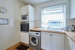 Fridge, microwave, oven, stovetop - Host & Stay | The Garden Flat, Seahouses (Seahouses)
