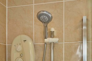 Regadera y secadora de cabello 
