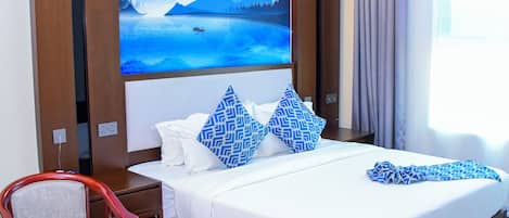 Desk, laptop workspace, free WiFi, bed sheets