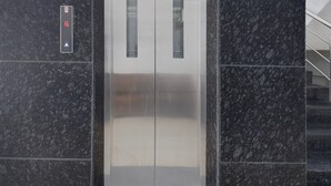 An elevator with a digital display and a control panel. - Deluxe Townhouse Pimple Nilakh Pune (Pune)