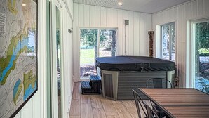A spacious indoor area with a pool table, wooden flooring, and a map on the wall. - New! Pet Friendly Lake Nockamixon Cottage Hideaway (Quakertown)