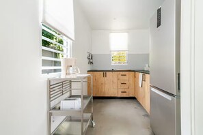 Fridge, stovetop, coffee/tea maker, toaster