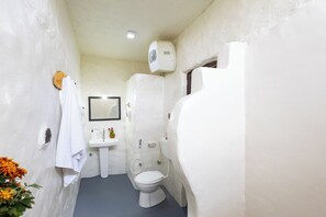 Deluxe villa, uitzicht op tuin | Badkamer