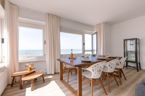 dining area with ocean views and modern furnishings
