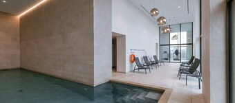 Beachside apartment w/ pool & gym access