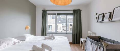 2 bedrooms, travel crib, WiFi, bed sheets