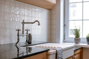 Shower, hair dryer, towels, shampoo