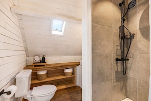 Shower, hair dryer, towels, shampoo