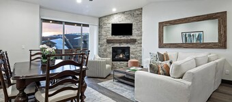Welcome to Modern Mountain Lodge, a refined luxury townhome just minutes from Park City and Deer Valley. Set against a stunning mountain backdrop, this thoughtfully designed retreat blends modern comfort with a warm alpine aesthetic.