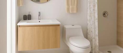 Regadera, toallas, papel de baño