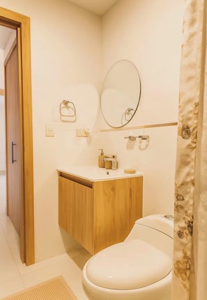 Shower, towels, toilet paper