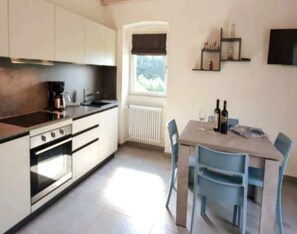 Private kitchen - Promotion - two-room apartment with private terrace Wormwood (Cadignano)