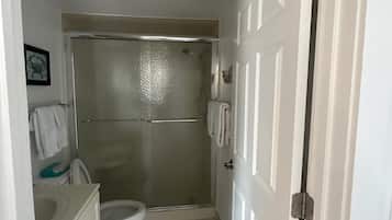 Jetted bath, hair dryer, towels, soap