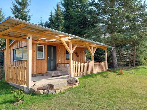 Cozy wooden cottage under the small Zschirnstein