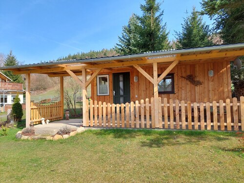 Cozy wooden cottage under the small Zschirnstein