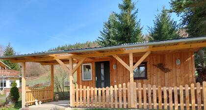 Cozy wooden cottage under the small Zschirnstein