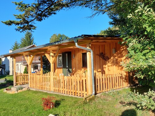 Cozy wooden cottage under the small Zschirnstein