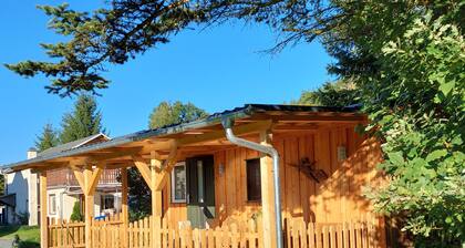 Cozy wooden cottage under the small Zschirnstein