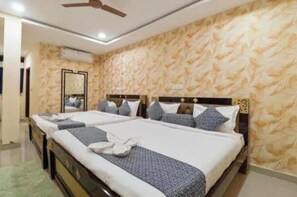 Deluxe fyrbäddsrum - utsikt mot staden