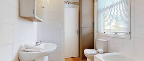 Hair dryer, towels, soap, shampoo