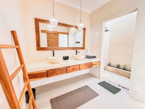 Shower, hair dryer, towels, toilet paper