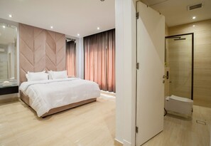 Appartement | Coffres-forts dans les chambres, fer et planche à repasser