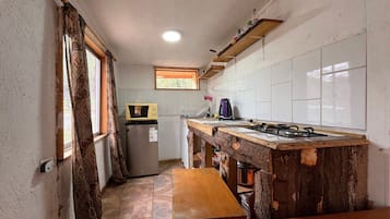 Cabin | Private kitchen | Fridge, microwave, cookware/dishes/utensils