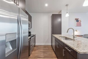 Fridge, microwave, oven, stovetop - Modern Apt Heart of Seaport (Boston, MA)