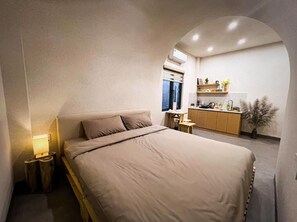 Standard Apartment, City View | Desk, laptop workspace, blackout curtains, soundproofing - Leu Vit Homestay Haiphong (Hong Bang)