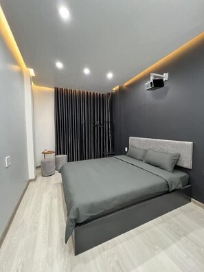 Standard Apartment, City View | Desk, laptop workspace, blackout curtains, soundproofing - Leu Vit Homestay Haiphong (Hong Bang)