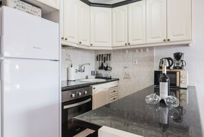 Private kitchen - Home2Book The Atlantic Allure Apartment (Puerto Rico)