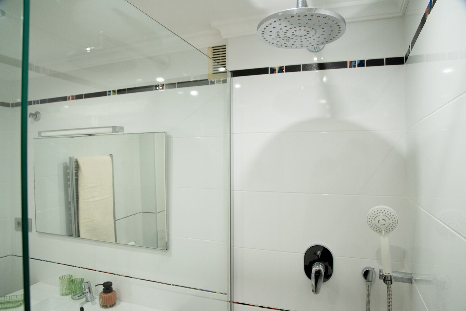 Shower, hair dryer, towels, toilet paper