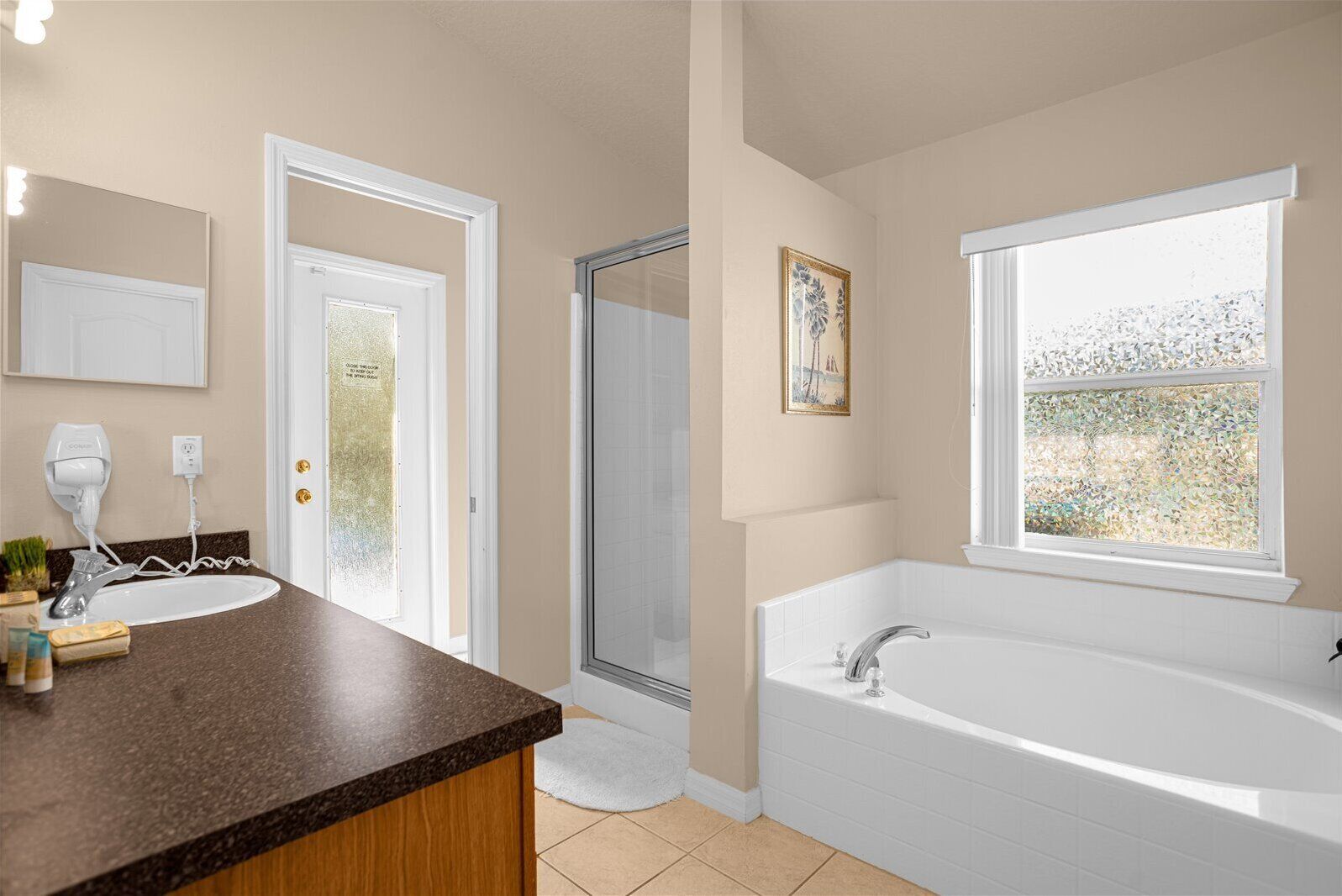 Shower, hair dryer, towels, toilet paper