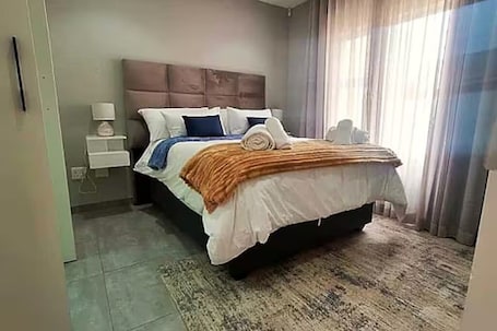 Iron/ironing board, WiFi, bed sheets. Corals Inn