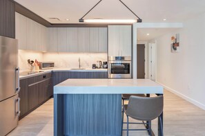 Fridge, microwave, oven, stovetop - Seaport Retreat - Rooftop Pool & Gym (Boston, MA)