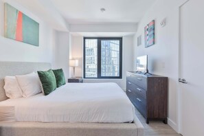 Desk, iron/ironing board, WiFi, bed sheets - Seaport Retreat - Rooftop Pool & Gym (Boston, MA)