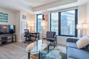 TV, offices - Seaport Retreat - Rooftop Pool & Gym (Boston, MA)