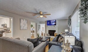 Living area - Chop House - King Bed, Smart TVs & Backyard Fun! (Douglasville)