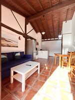 Apartamento, 2 quartos | Área de estar