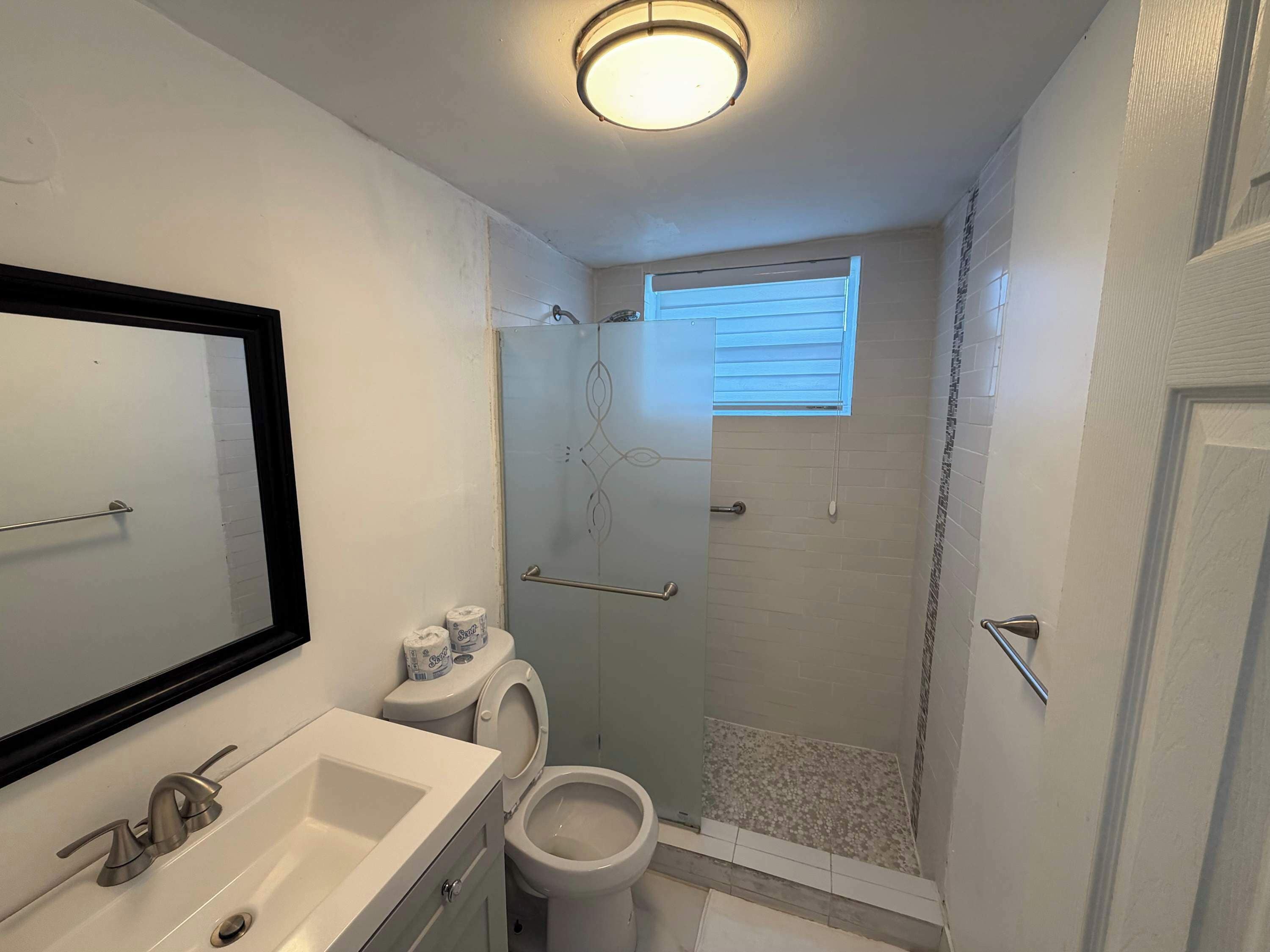 Shower, hair dryer, towels, shampoo