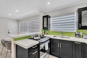 Fridge, microwave, oven, stovetop - Elegant 2BR in Bay Harbor Islands near beach, Bal Harbour Shops, and dining (Bay Harbor Islands)