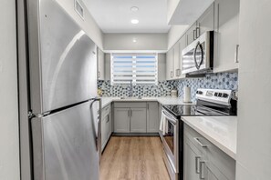Fridge, microwave, oven, stovetop - Spacious 3BR in Bay Harbor Islands minutes to beach, shops, and dining (Bay Harbor Islands)