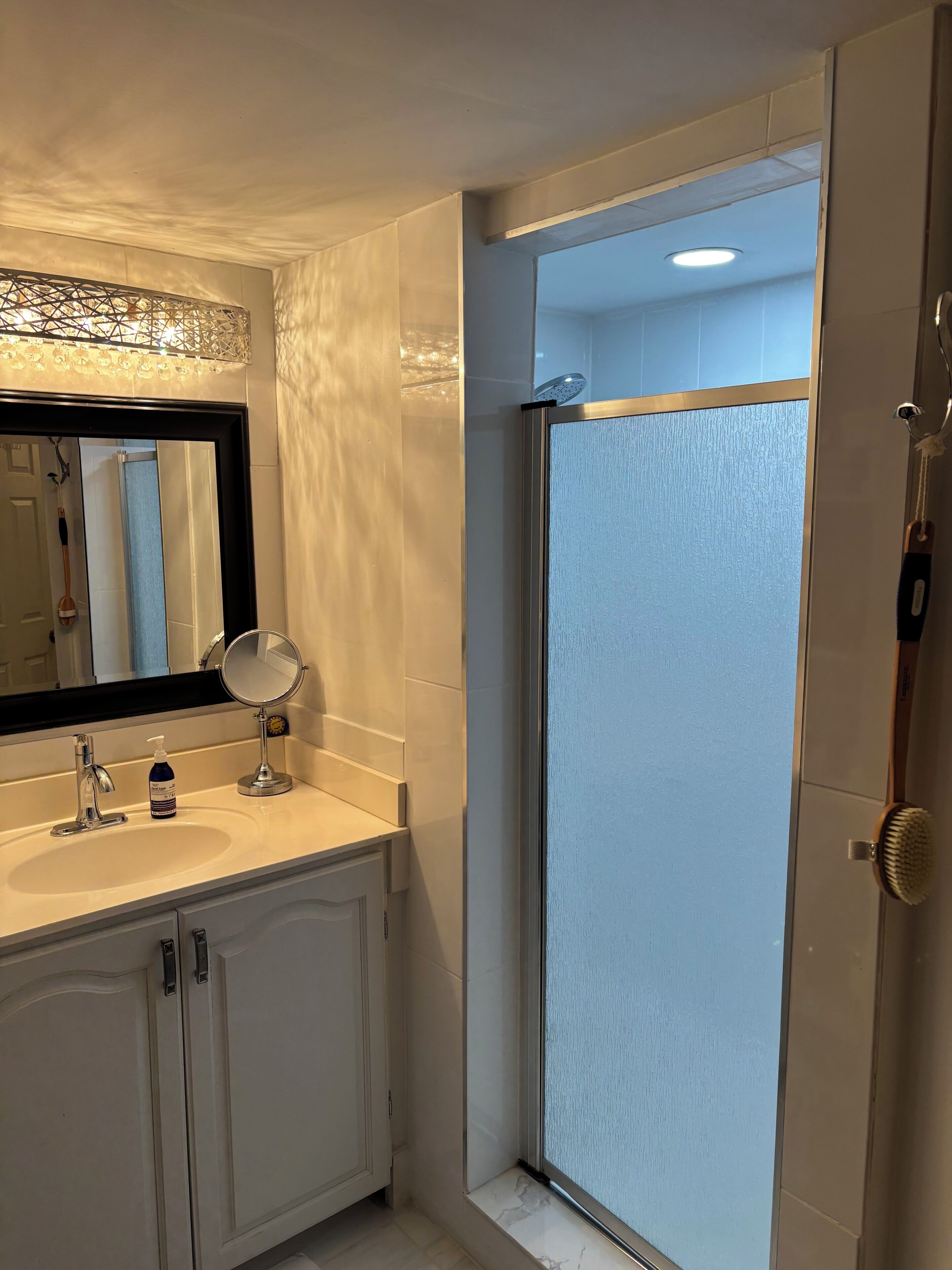 Hair dryer, towels, soap, toilet paper