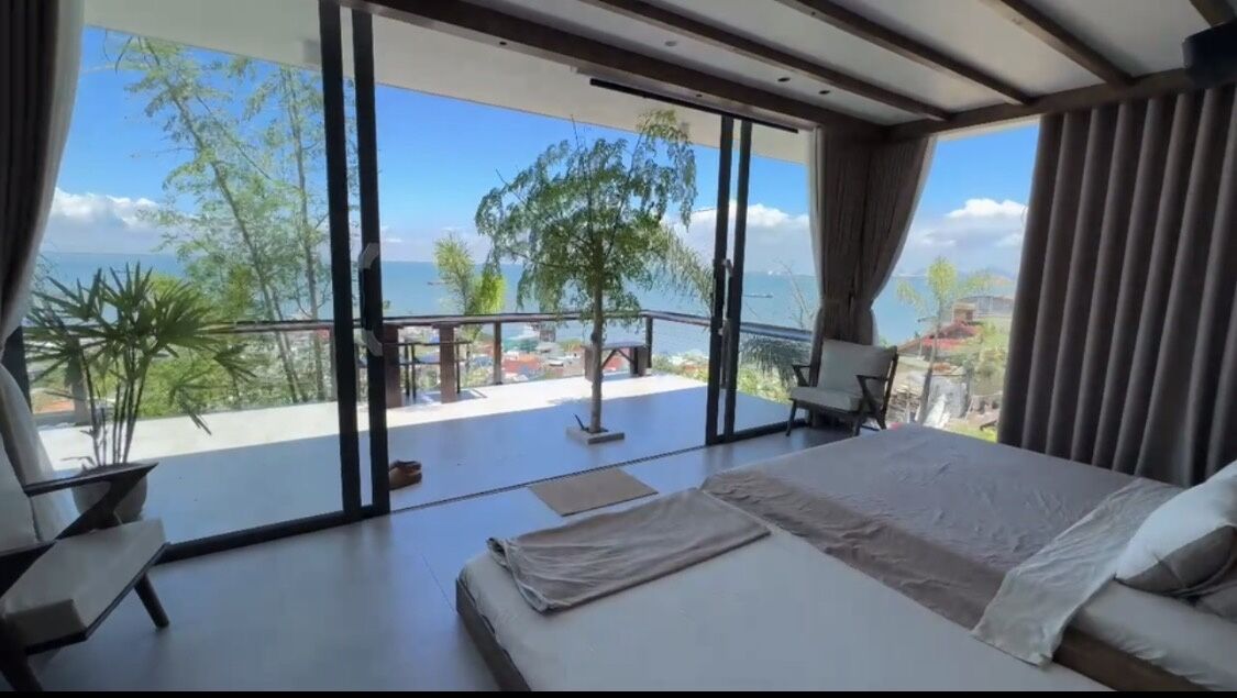 Deluxe Quadruple Room, Balcony, Sea View | Desk, blackout drapes, iron/ironing board, free WiFi