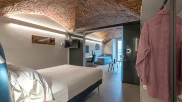 Superior Suite, Sea View | Free minibar items, in-room safe, desk, laptop workspace